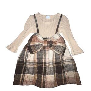 Toddler girl's long-sleeve patchwork plaid dress.